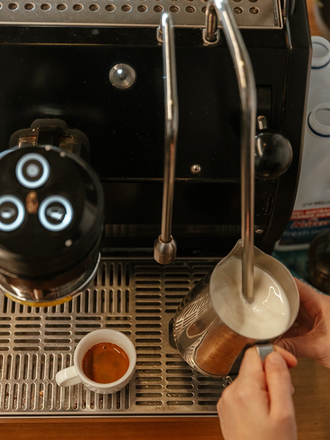Overhead of the La Marzocco pulling shots